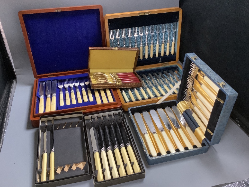 Assorted cased sets of plated flatware and cutlery including dessert knives and forks